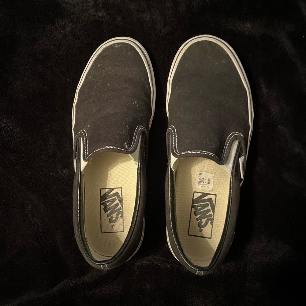 black and white slip on vans